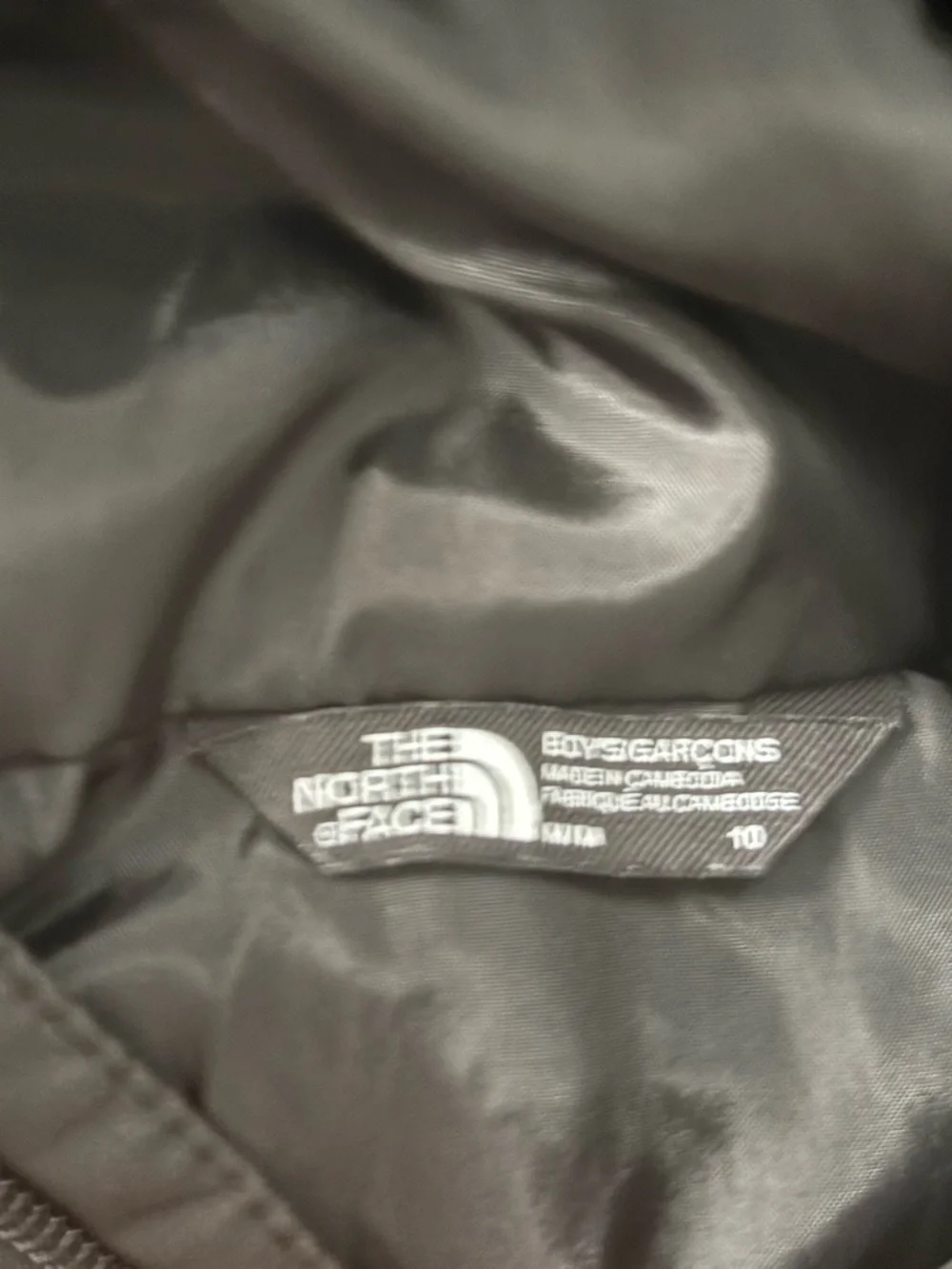 The North Face Kids Neon Yellow and Black Rain Jacket